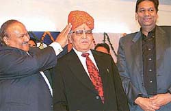 Mr Anshuman Singh, Governor of Rajasthan, being felicitated by Mr P.K. Tayal, chairman, Bank of Rajasthan Limited