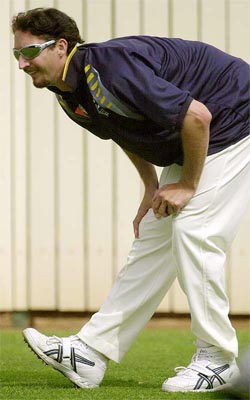 Australia�s fast bowler Jason Gillespie stretches his leg