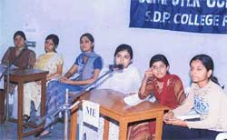 Girls participate in an IT quiz organised by SDP College