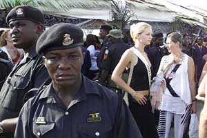 Security surrounds an unidentified Miss World contestant