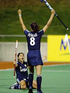 Argentina's Natali Doreski celebrates on her knees
