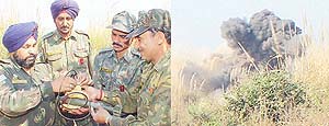 Army personnel tie explosives on trunch mortar which was recovered from Sector 38; (right) a cloud of dust over Grain Market in Sector 39 appeared when the mortar was detonated in Chandigarh on Thursday.