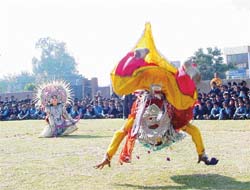 �Chhau� dancers perform at Bhartiya Vidya Mandir