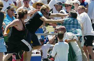 Spectators brawl in the stands