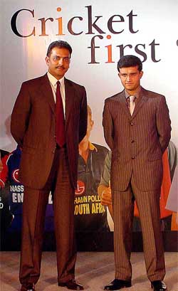 Indian cricket captain Saurav Ganguly with former captain Ravi Shastri at the unveiling of the cricket World Cup