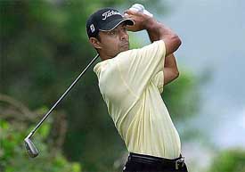 Asian PGA player Jyoti Randhawa of India tees off on day two