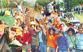 Government college of Art students lead the procession of colours from Madhya Marg to the Leisure Valley, where The Tribune - sponsored Chandigarh Carnival began