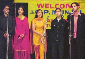 Students of Government College render a song at a cultural evening, Kahkashan