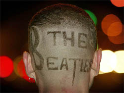 Canada's Carlos Branco sports a Beatles hair cut