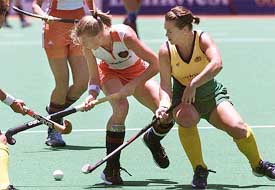 Netherlands' Mijntje Donners and Australia player Louise Dobson