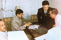 Sales tax officials examine the accounts of the restaurant contractor of the Gymkhana Club during a search and seizure operation, in Panchkula on Thursday