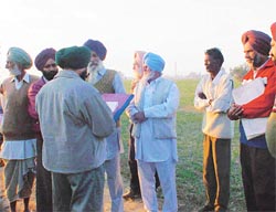 The Executive Magistrate, Mr Joginder Singh, records statements of villagers, while conducting an inquiry in Jaspal Bangar village