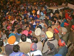 Residents gherao B-division police station in protest against the killing of a photographer by the groom�s uncle in a freak accident at a marriage palace in Amritsar on Monday.