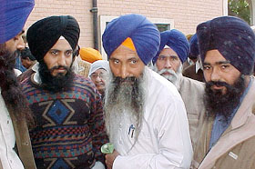 A former Jathedar of Takht Shri Damdama Sahib, Giani Kewal Singh, who is facing trial in a dowry death case, comes out of the court 