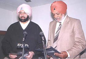 Punjab Chief Minister Amarinder Singh administers the oath of office and secrecy to Brig Charanjiv Singh Harika (retd) as Chairman of the Punjab Subordinate Services Selection Board 