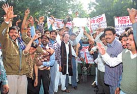 Autorickshaw drivers protesting against the alleged high-handedness of the authorities in enforcing installation of electronic meters in the Capital on Wednesday.