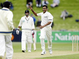 India's Sanjay Bangar celebrates taking the wicket