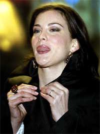 US actress Liv Tyler smiles at photographers