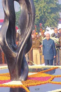 Deputy Prime Minister L.K. Advani paying homage to the Delhi Police personnel, who sacrificed their lives defending Parliament last year