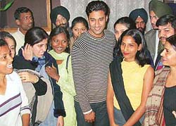 Singer-turned-actor Harbhajan Mann with fans at a Sector 35 food joint where he was honoured for his contribution to Punjabi film industry in Chandigarh on Saturday.