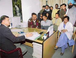 Management and employees of the Dayanand Medical College and Hospital hold a meeting 