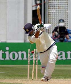 India�s Rahul Dravid is clean bowled for seven by New Zealand�s Shane Bond on the third day of the first cricket