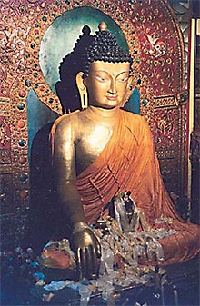 The giant gilded Buddha in the Tawang monastery