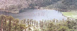 Encircled by towering cliffs, the Madhuri Lake is extremely picturesque.