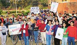 NSS campers of Punjab Engineering College take the pledge for "no vehicle day", on the college campus in Sector 12, Chandigarh, on Sunday