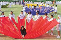 Students of St Xavier Senior Secondary School, Sector 44, at the annual sports day of the school, perform a peacock drill in Chandigarh on Sunday