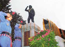 NCC cadets of the air wing salute the statue of Flying Officer Nirmal Jit Singh Sekhon on Vijay Divas 