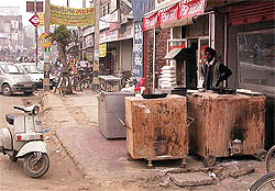 Tandoors outside a takeaway joint at the railway crossing 