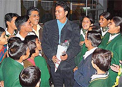 Cricketer Dinesh Mongia interacts with students of Satluj Public School, Sector 4, Panchkula, during the annual function of the school