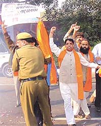 Shiv Sena activists celebrating after the pronouncement of the sentence in the Parliament attack case outside Patiala House Courts in the Capital