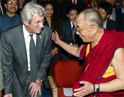 Tibetan spiritual leader The Dalai Lama greets Hollywood star and chairman of the Board of International Campaign for Tibet Richard Gere