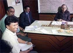 Indian cricket Board chairman Jagmohan Dalmiya sits with national selectors