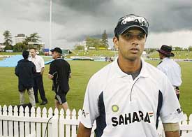 Indian cricket player Rahul Dravid leaves the pitch