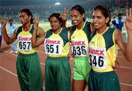 Andhra Pradesh Women's team showing the victory sign