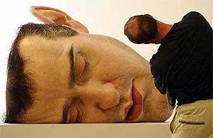 A visitor to the Museum of Contemporary Art in Sydney on Friday strikes an unusual pose