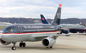 US Airways Group Inc. plans to reduce annual costs by $1.8 billion and hopes to emerge from bankruptcy protection next March, the carrier said in its reorganisation plan