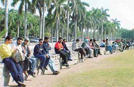 Students relax in the winter sunshine at PU