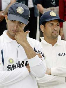 India�s captain Saurav Ganguly stands with Sachin Tendulkar after they lost the second cricket Test against New Zealand