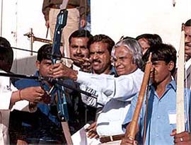 President A.P. J.  Abdul�Kalam tries his hand at archery