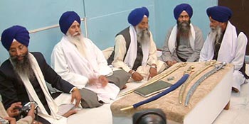 he Sikh high priests during a meeting