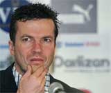 Former German captain Lothar Matthaeus listens to journalists' questions