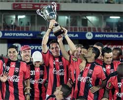 Costa Rican players from Alajuelense celebrate winning the Central America Championship of Clubs