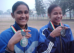 Surekha Rana and Pooja Chauhan show their medals