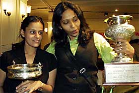 New snooker champion Vidya Pillai of Tamil Nadu and billiards champion Anuja Thakur of Maharashtra with their trophies after the prize distribution function of the 11th Ladies Billiards and Snooker Championship in Jammu 