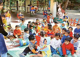 Tiny tots of Little Kangaroos School bask the morning sun on the school campus on the Kishangarh road in Chandigarh.