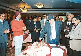 The UT Administrator, Lieut-Gen J.F.R. Jacob (retd), cuts a cake to inaugurate Rustles